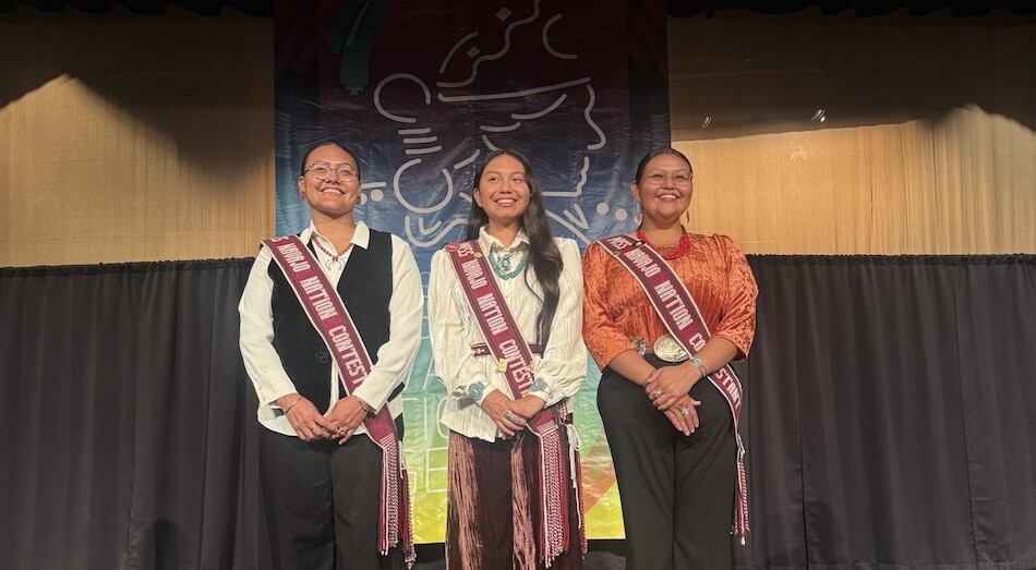 Three contestants onstage at the 74th Annual Miss Navajo Nation Pageant